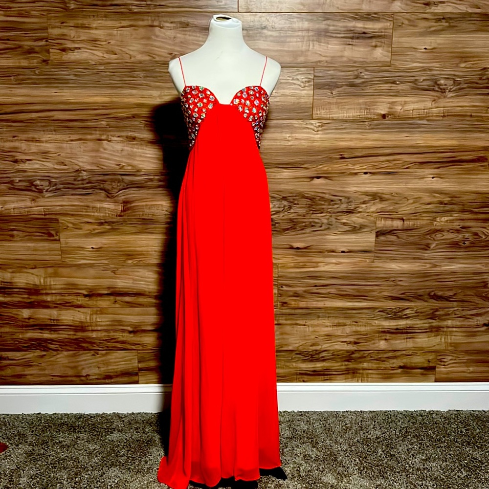 Fuchsia formal woman’s dress with beading throughout size 3/4